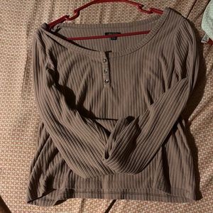 kind of like a beige purple/pink sweater. L